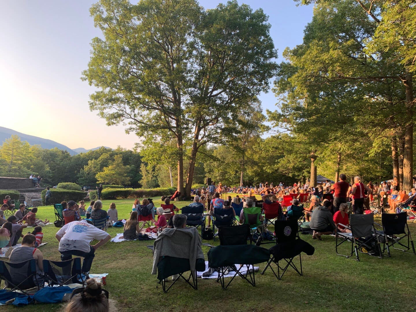 Visitors on the lawn at Opus 40