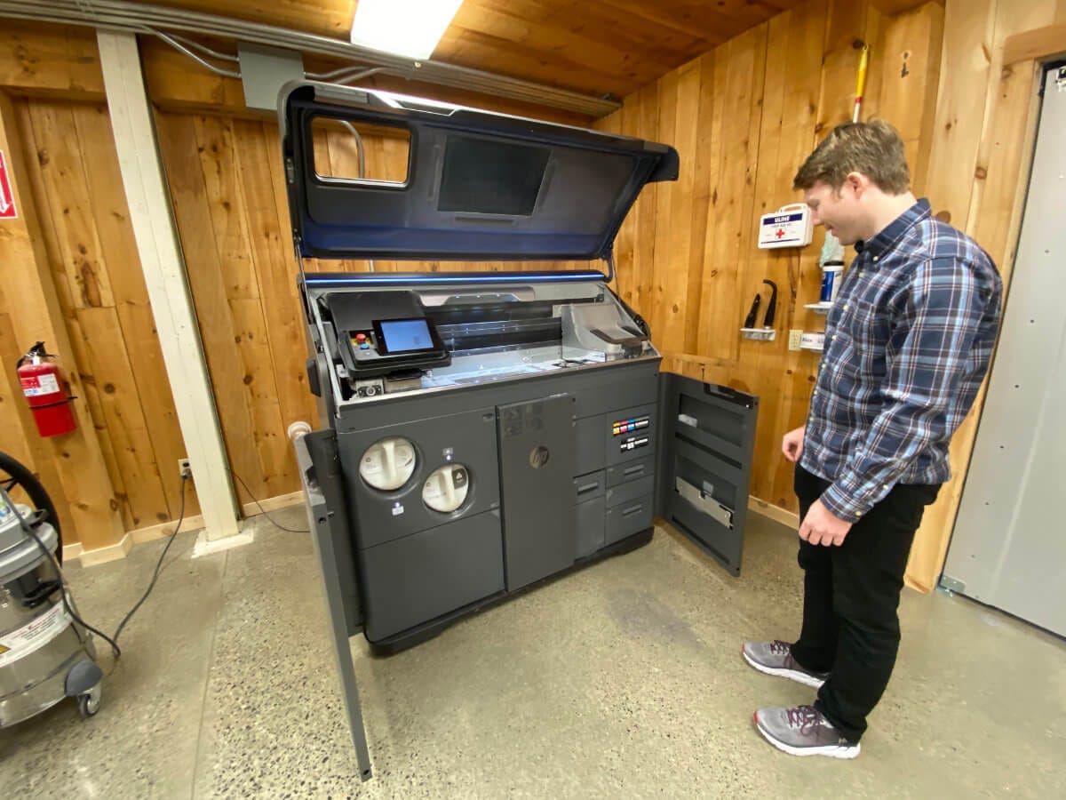 Easton LaChappelle with a large 3D printer at Unlimited Tomorrow headquarters in Rhinebeck