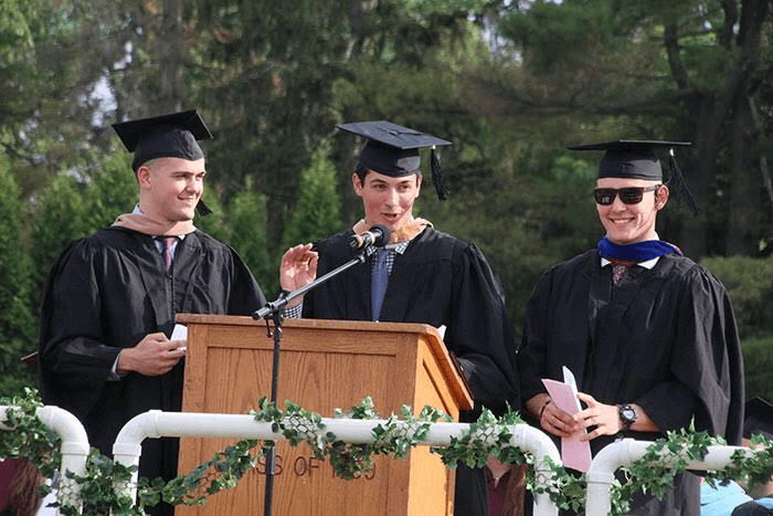 Jordan (KHS ‘13), Jake (KHS ‘12), and Jimmy (KHS ‘11) give the commencement speech at the 2018 Kingston High School graduation at Dietz Stadium